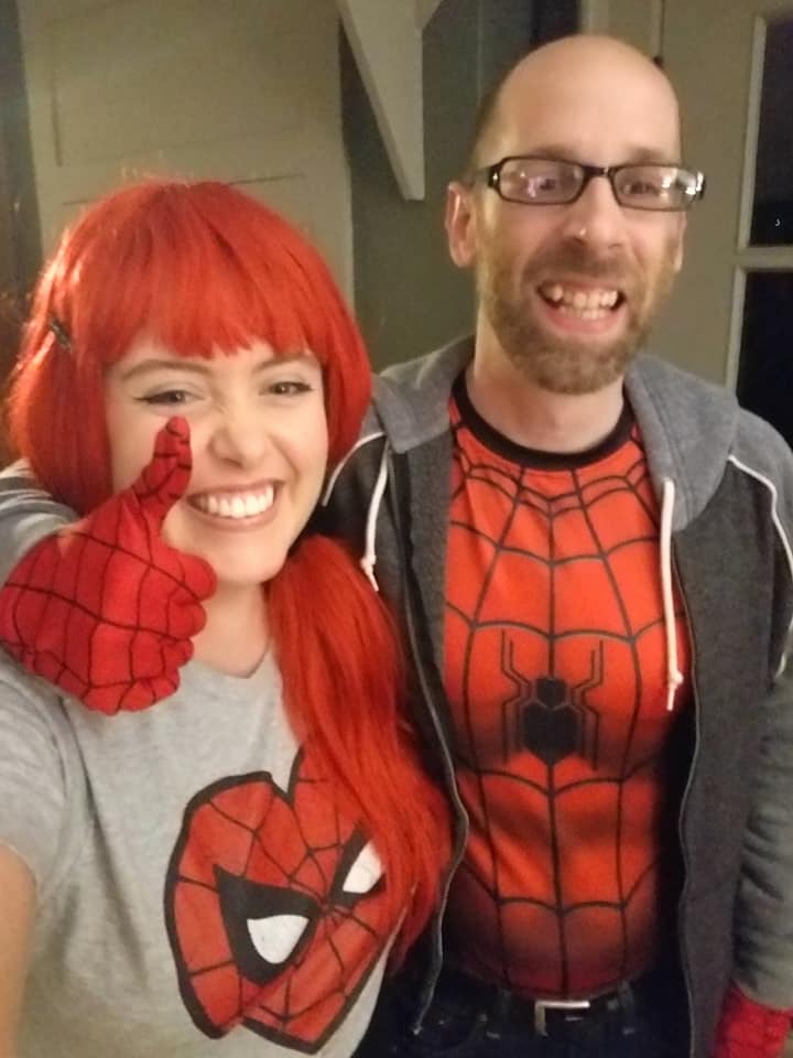 Photo of Christina and her husband dressed up as Spiderman and MJ.